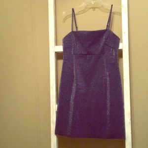 Dark blue , knee length strapless dress.